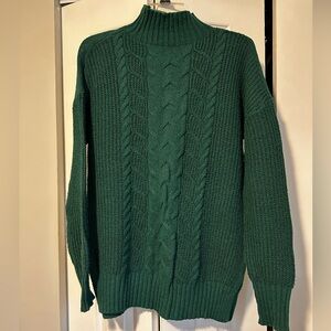 Women’s green cable knit sweater. Maurice’s brand. Size small.